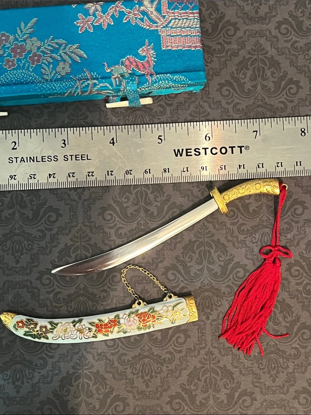 Decorative Gold-Tone Mini Scimitar Letter Opener with Red Tassel
